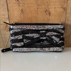 Kate Spade E.B. Night Sky sequin striped evening bag with bow accent
